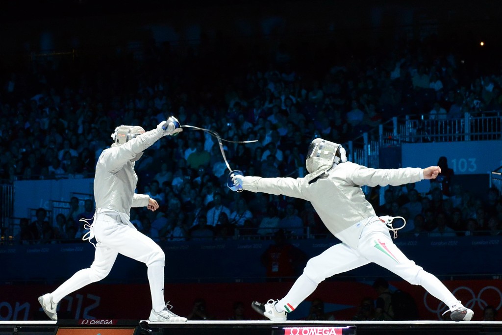 Head parry executed in the 2012 Olympics medal round for Men's Sabre.  Photo C. Harkins / Fencing.Net