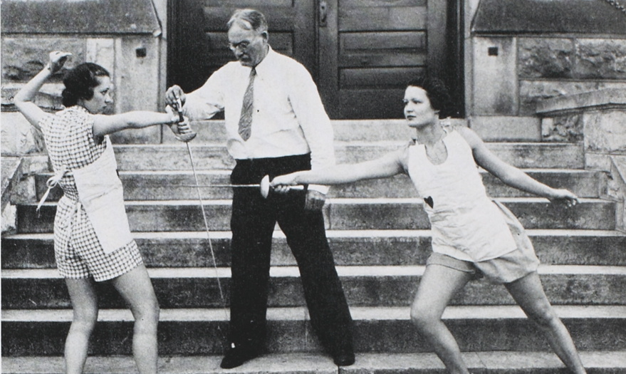 Dr. Naismith instructing the women’s fencing team. Photograph from the Dec. 1936 Jayhawker yearbook