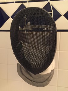 hang drying a fencing mask